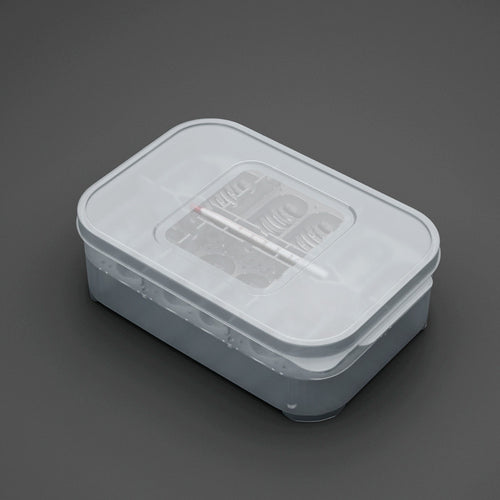 Clear plastic container with a lid on a dark gray background