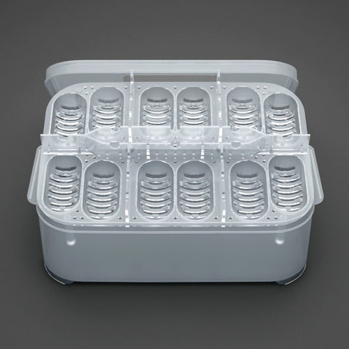 Clear plastic container with multiple compartments on a dark gray background