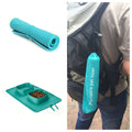 Set of teal pet accessories including a mat, bowl, and portable pet bowl holder.