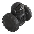 Black textured object resembling a robot or mechanical device on a white background